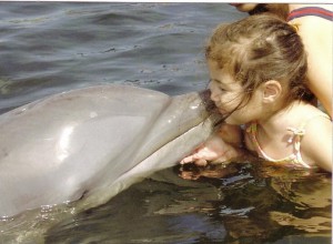 Dolphin-Swimming-with-Girl